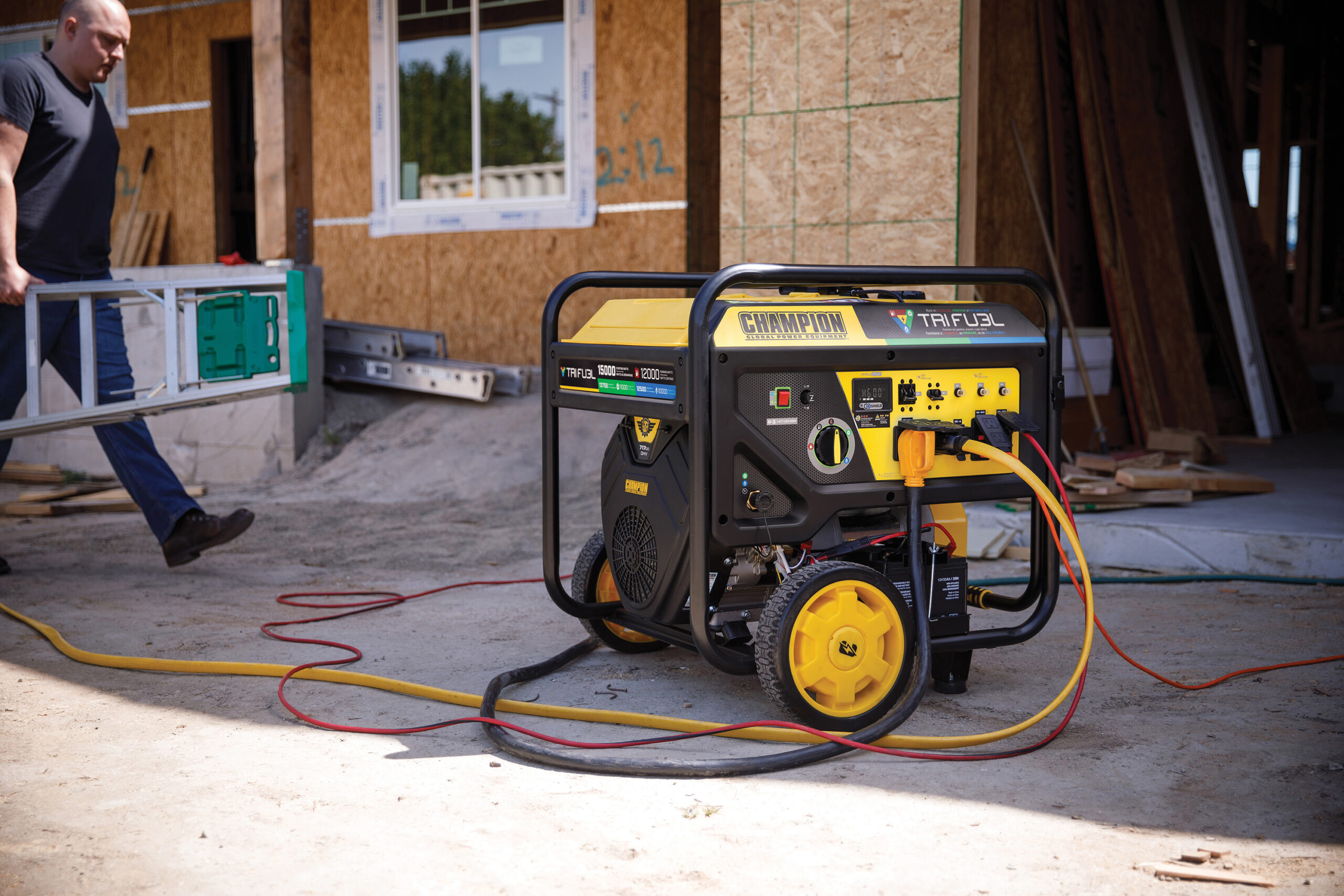 a man is standing next to a generator in a construction site.